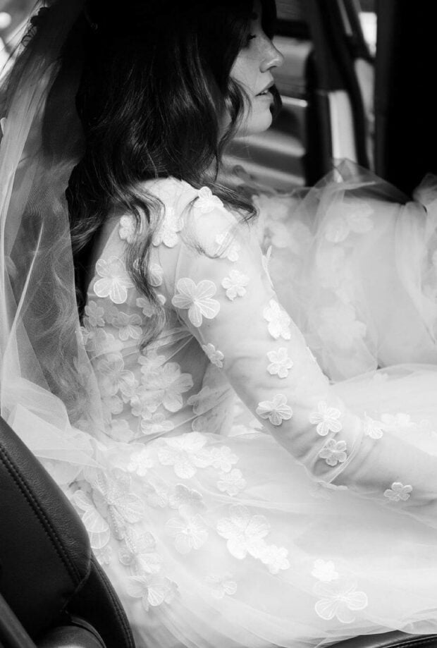 Christina wearing Ari gown, topper & veil