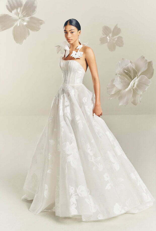 René Gown bold floral strapless bustier wedding dress with long