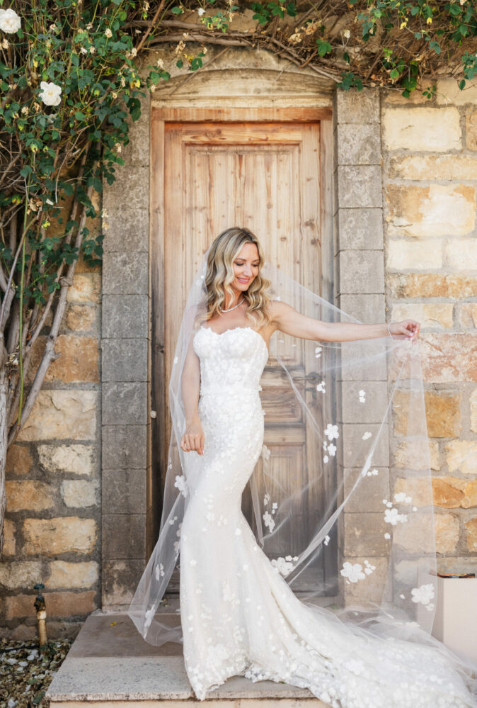 Michelle Demaree wearing Karlee gown and matching veil