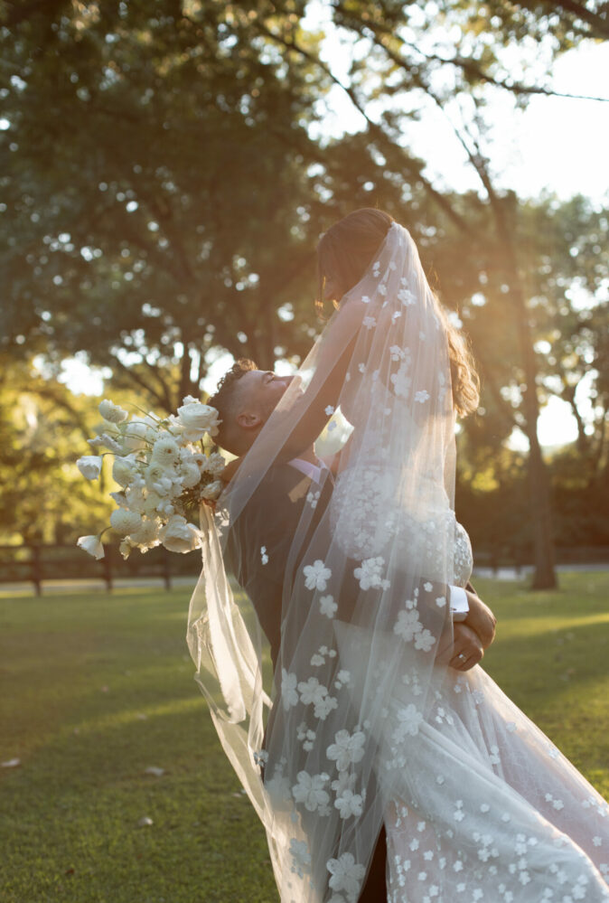 Alexandria Pippenger wearing Karlee gown and matching veil