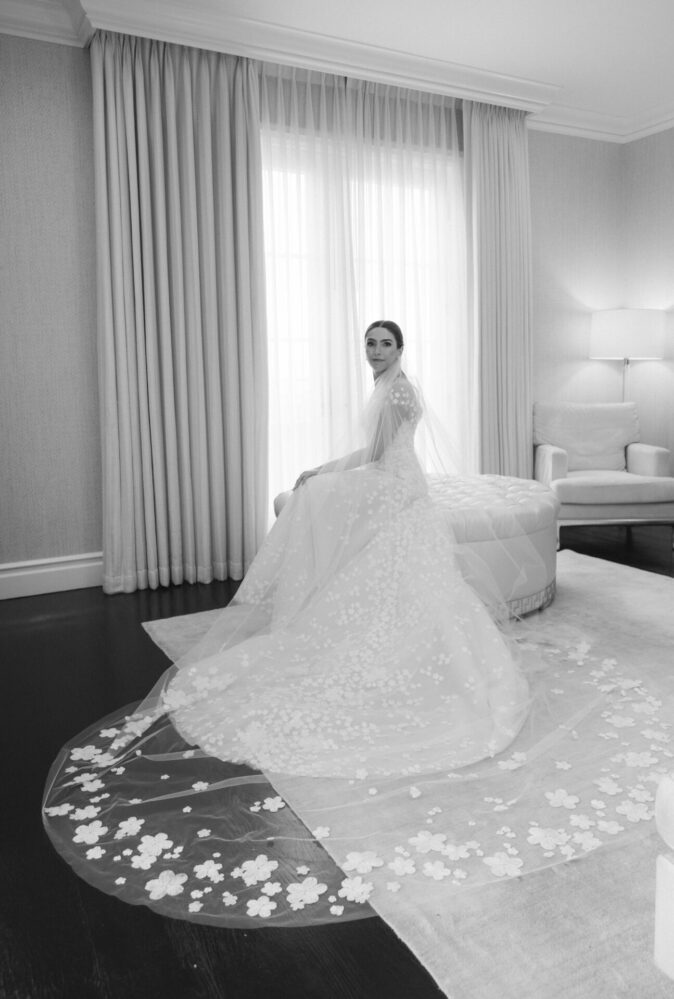 Amanda Michaud in Karla gown with matching veil and short-sleeve topper