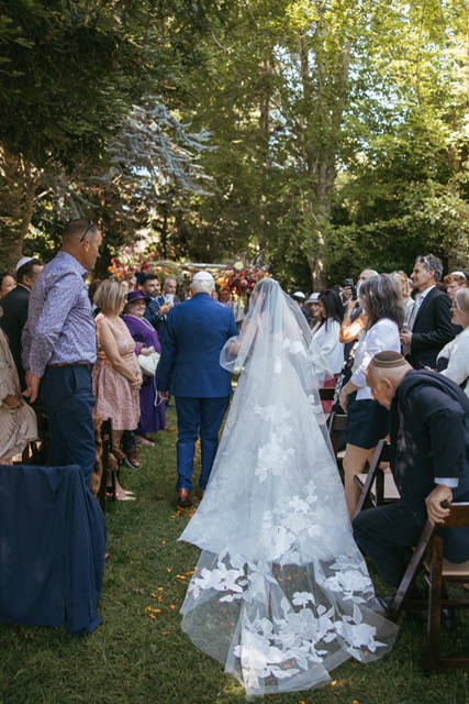 Sara Luzon in Suma gown with matching veil